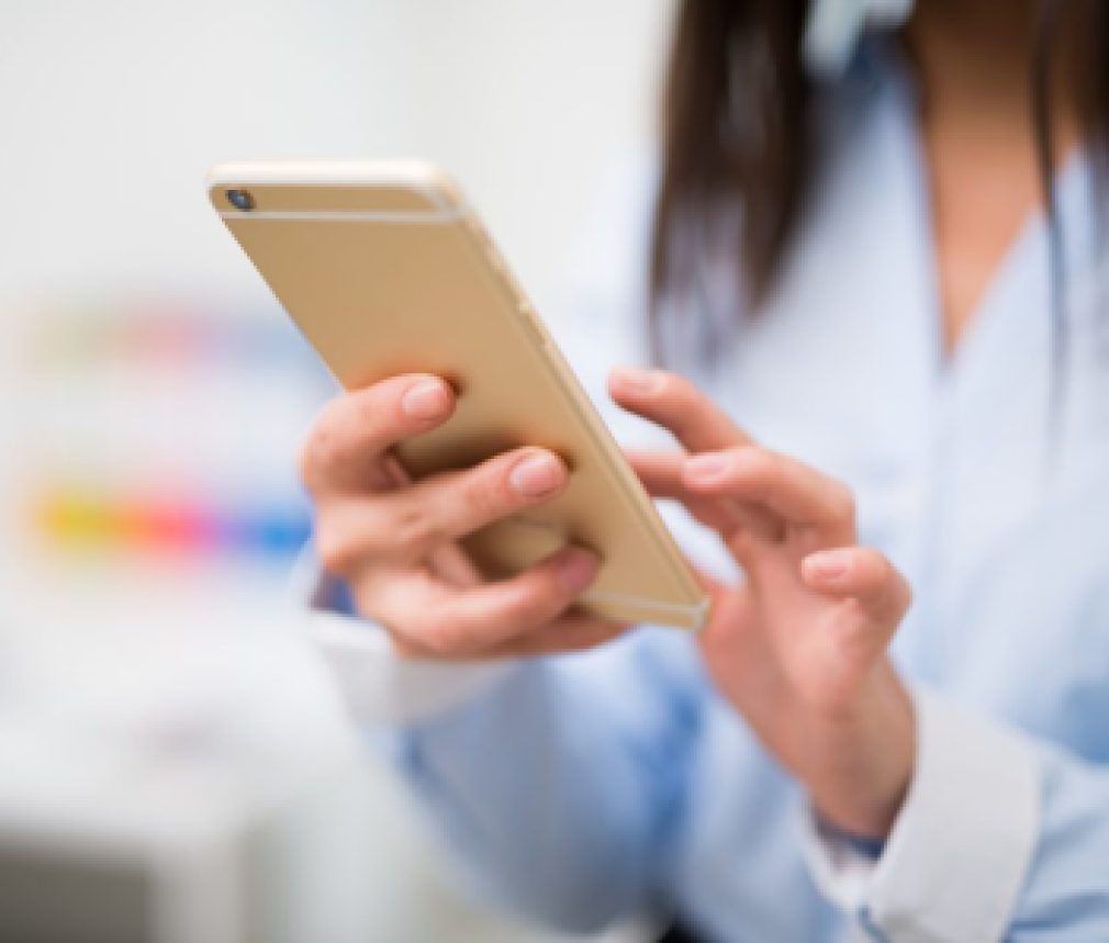 Woman using her mobile phone