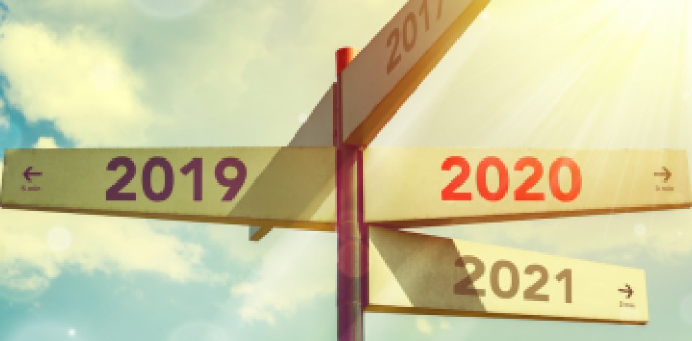 2020 New Year. Direction indicator in the number of the year, against the sky. New Year concept