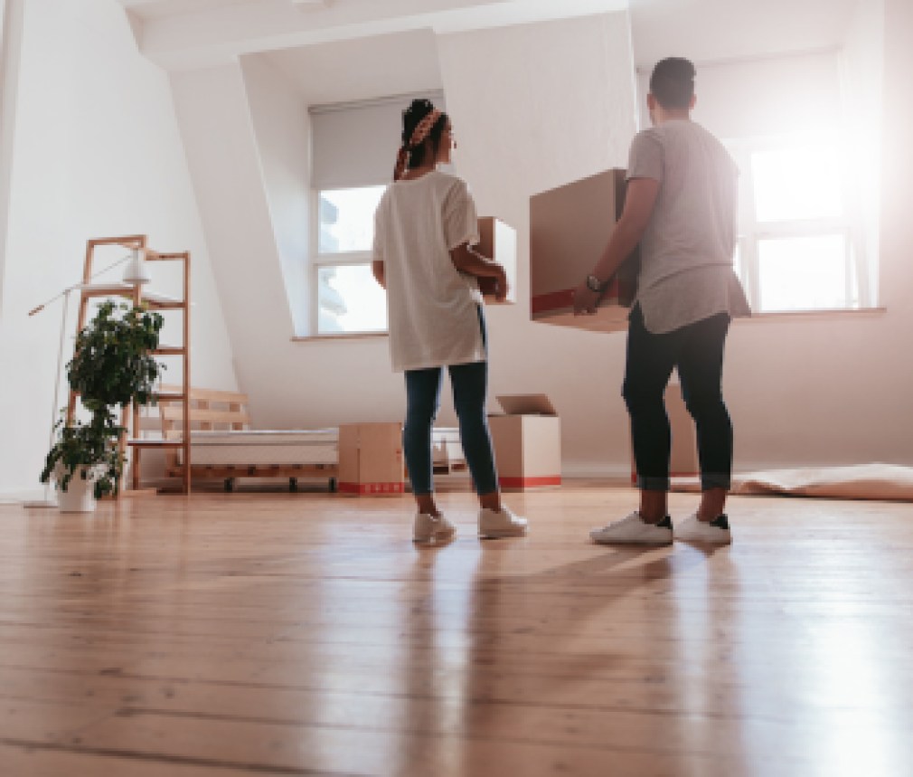 Young couple moving in new house