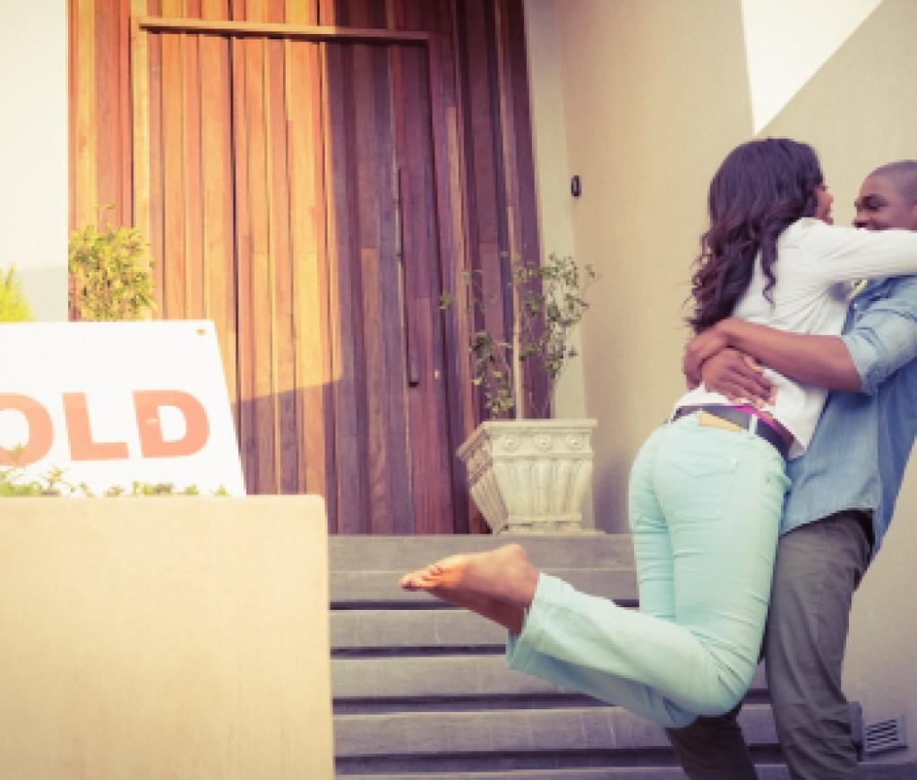 Happy couple after buying new house