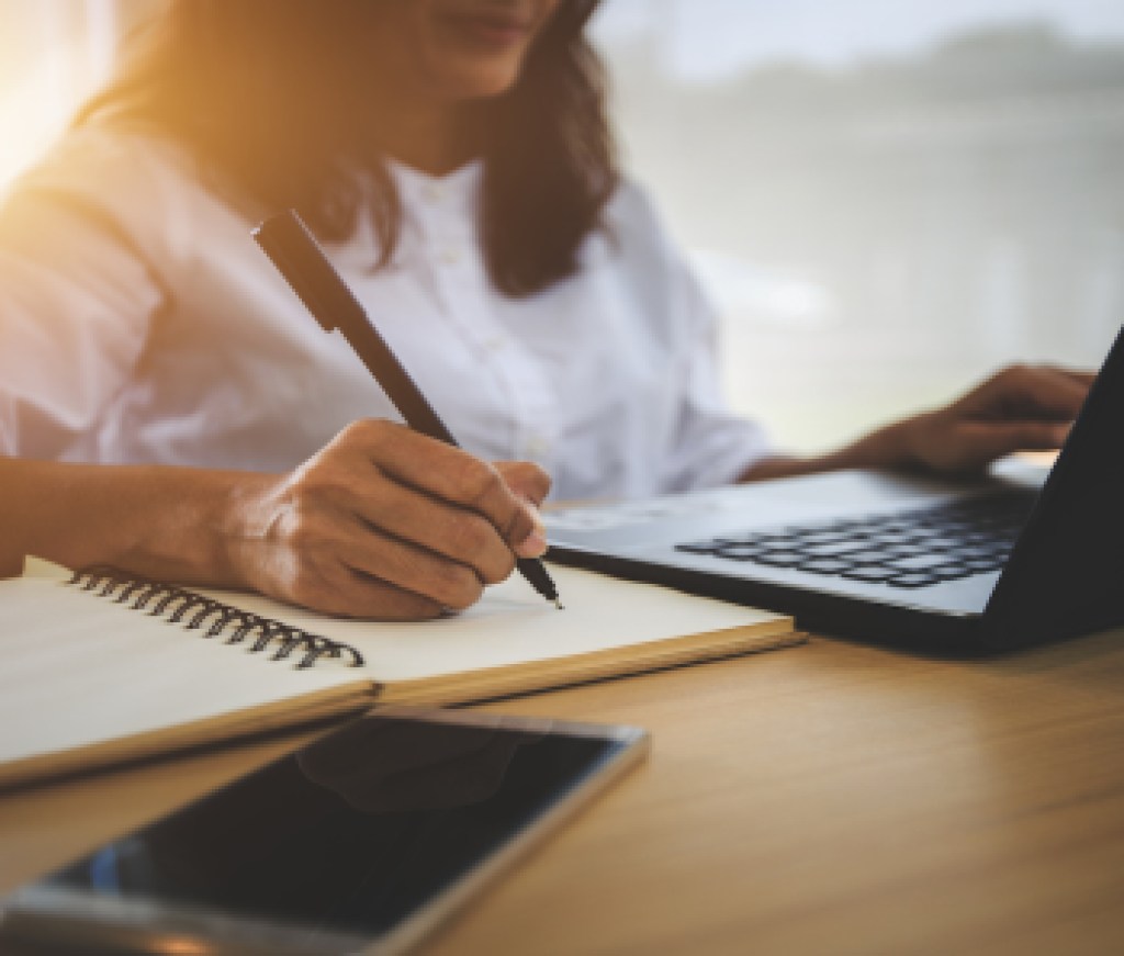 young woman  with learning language during online courses using netbook