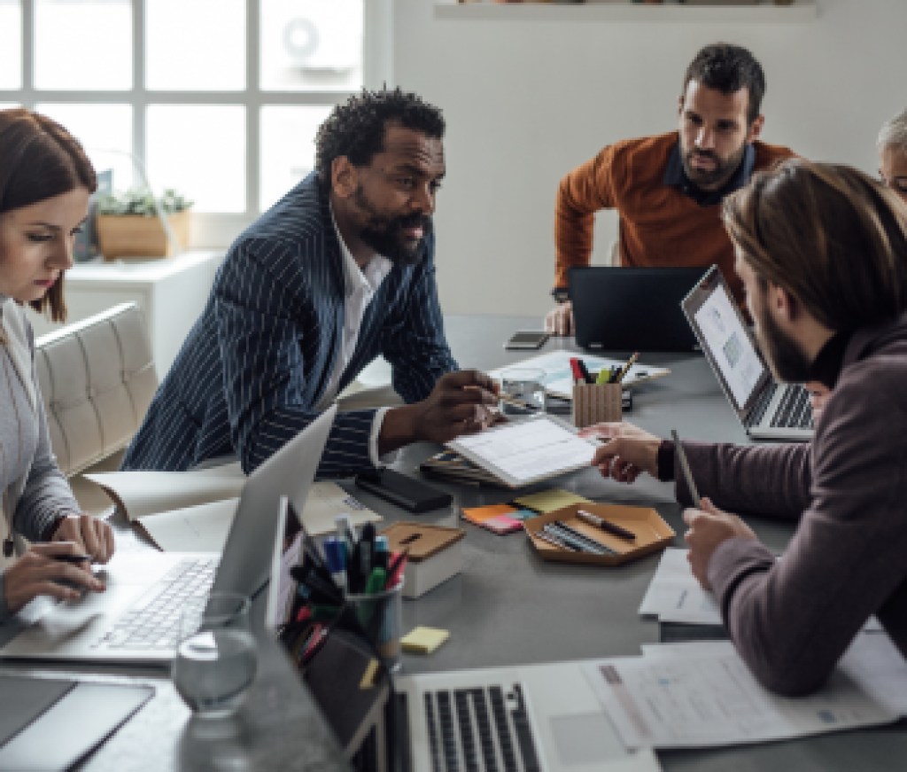 Multiethnic Group of Businesspeople on a Meeting