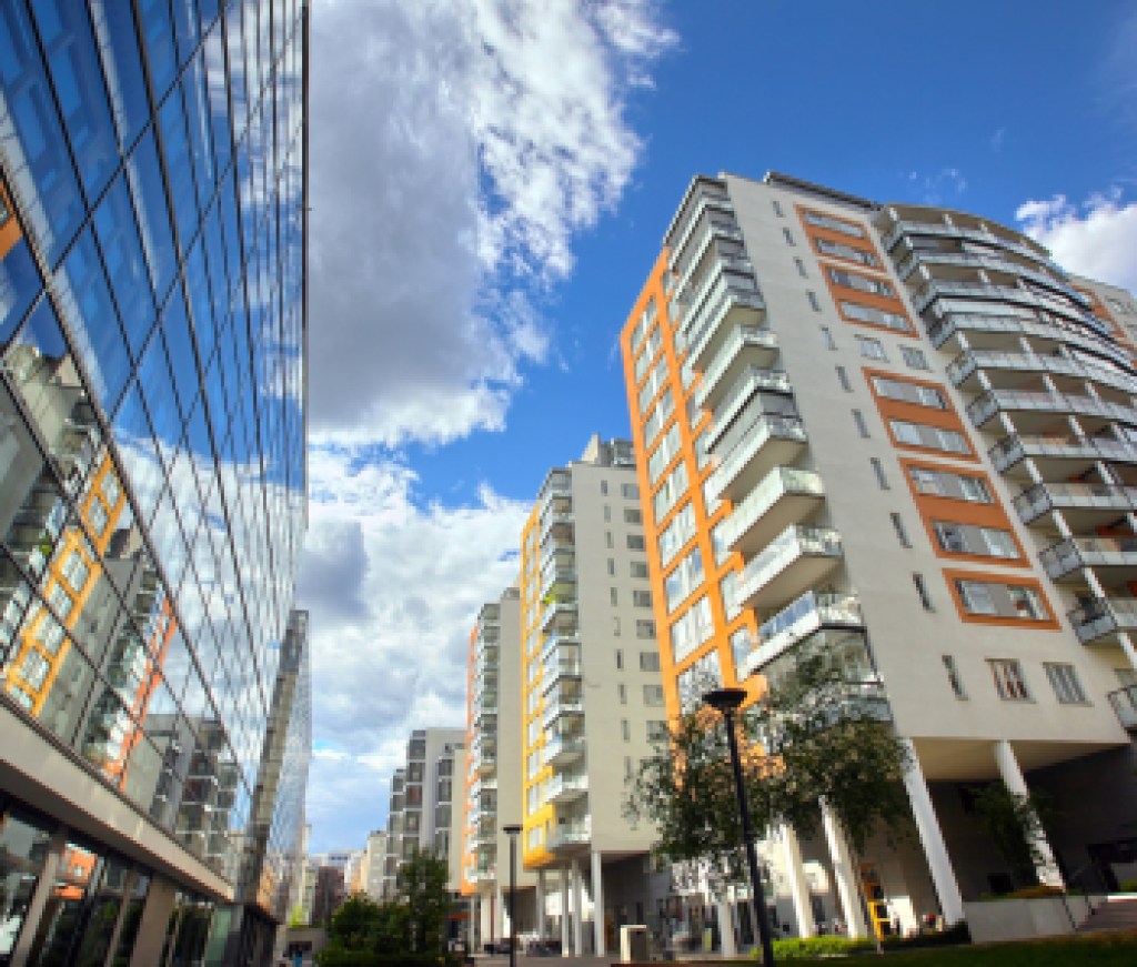 modern apartments with a blue sky