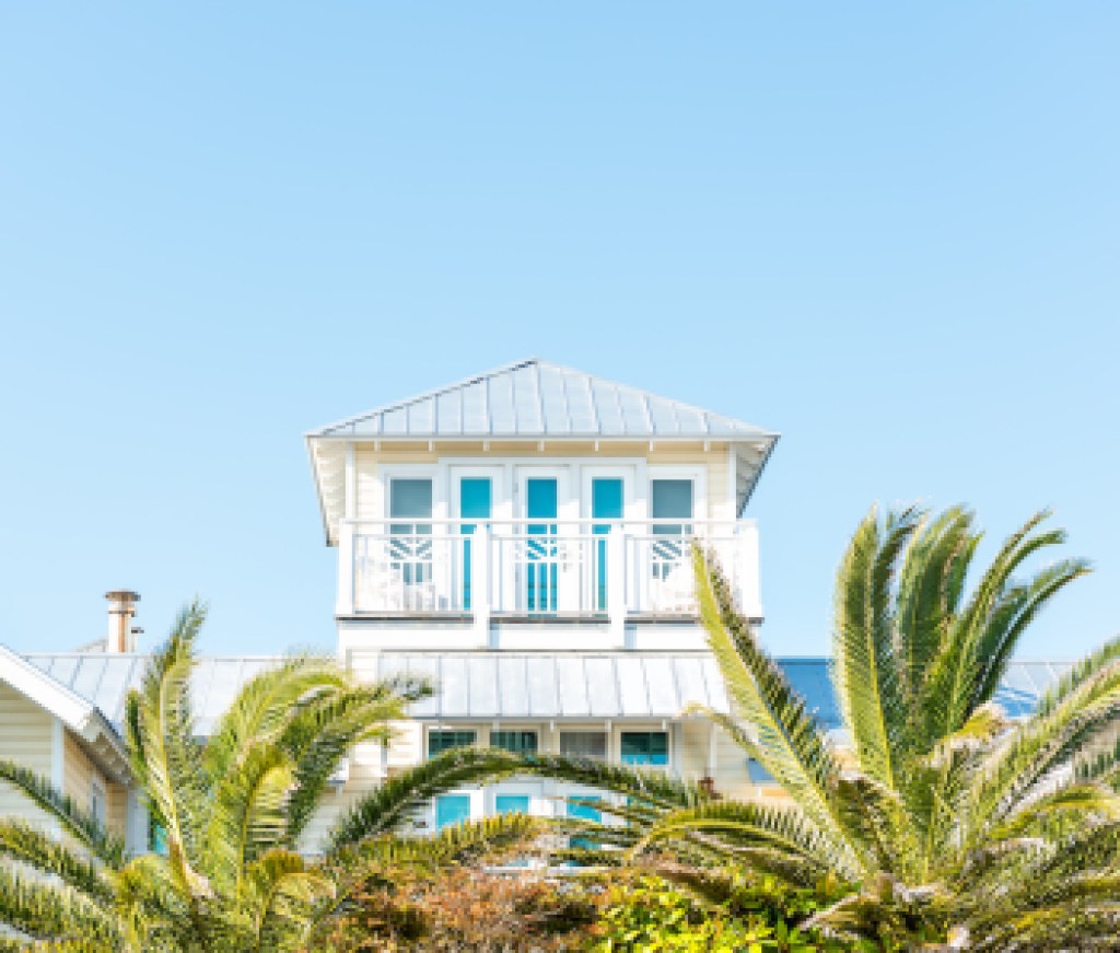 Wooden house tower new urbanism modern architecture by beach ocean, nobody in Florida view during sunny day