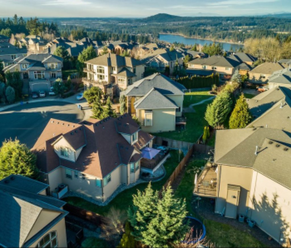 Beautiful luxury neighborhood in the Pacific Northwest photographed at sunset from the air