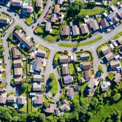 top down view of medium income single family home neighborhood