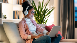 Woman listening to real estate podcast