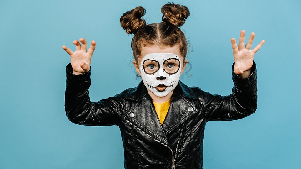 Little-girl-with-painted-face-for-Halloween