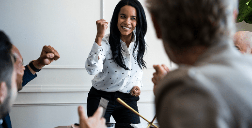 Young woman leading a team meeting